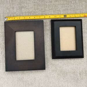 2 black frames, Crate & Barrel and unknown.